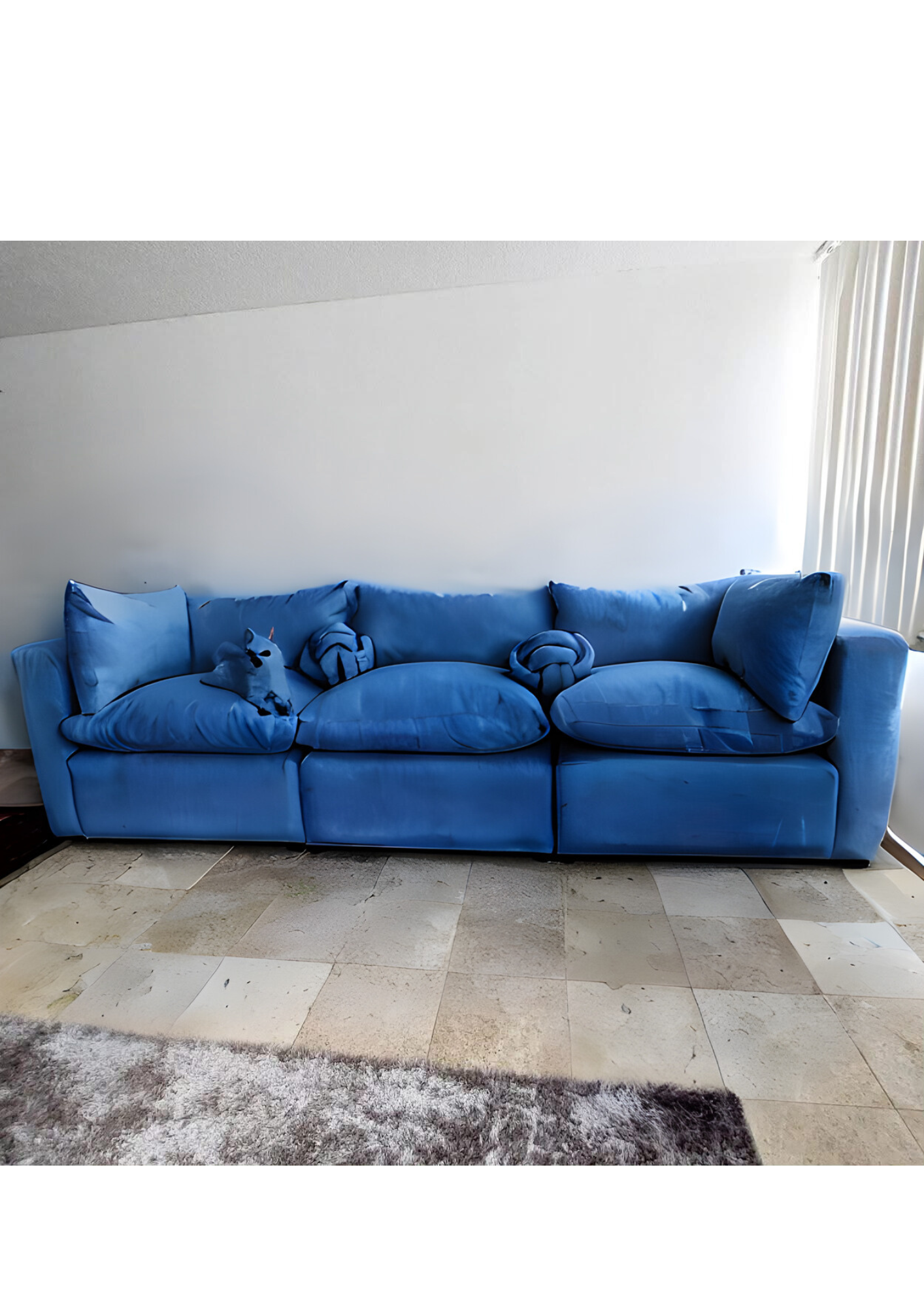 Sofa acolchado de tres modulares